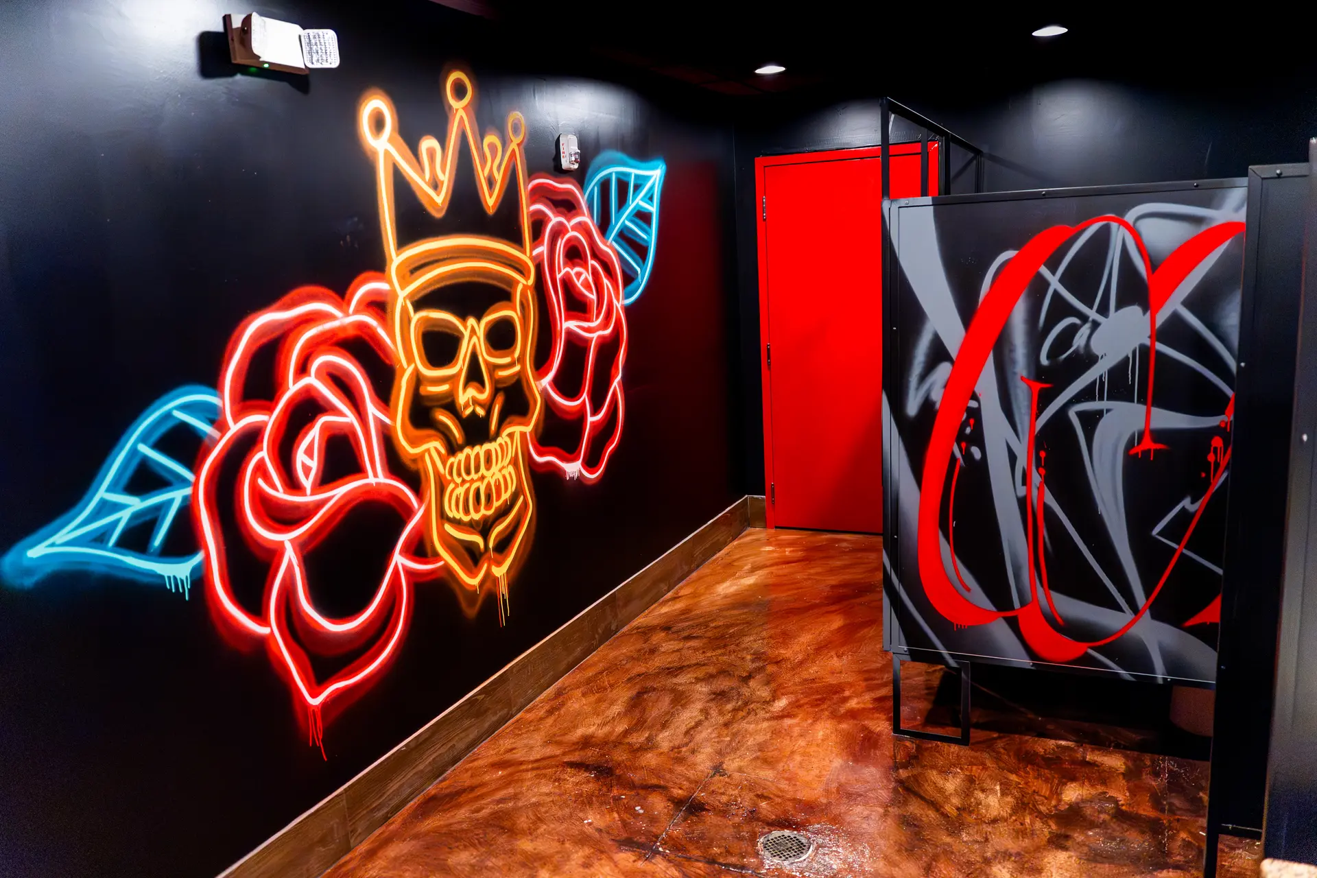 Custom skull and roses graffiti-style artwork in our bathroom